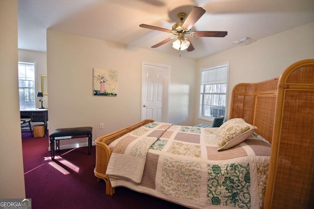 carpeted bedroom featuring ceiling fan