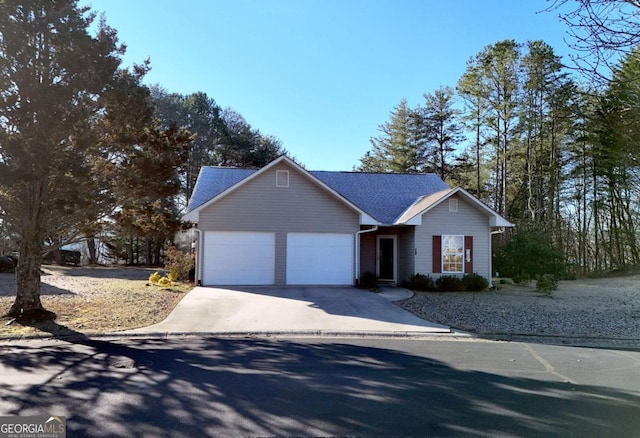 single story home with a garage