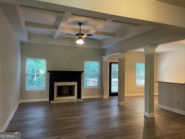 unfurnished living room with ceiling fan, beam ceiling, plenty of natural light, decorative columns, and coffered ceiling