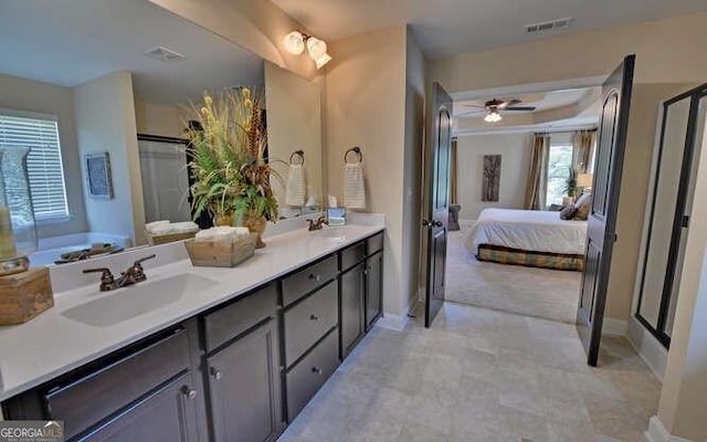 bathroom with vanity and ceiling fan