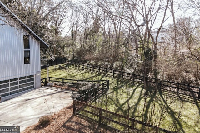 view of yard featuring a garage