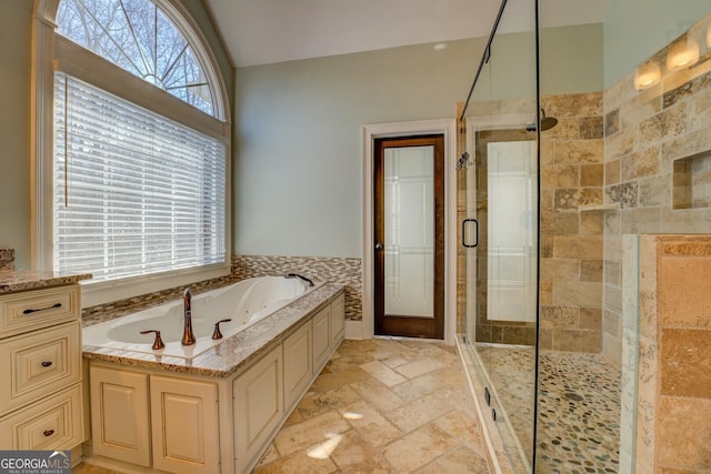 bathroom with independent shower and bath