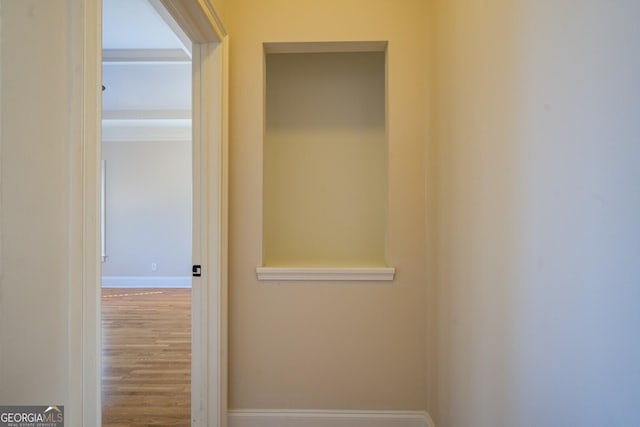 hallway featuring hardwood / wood-style flooring