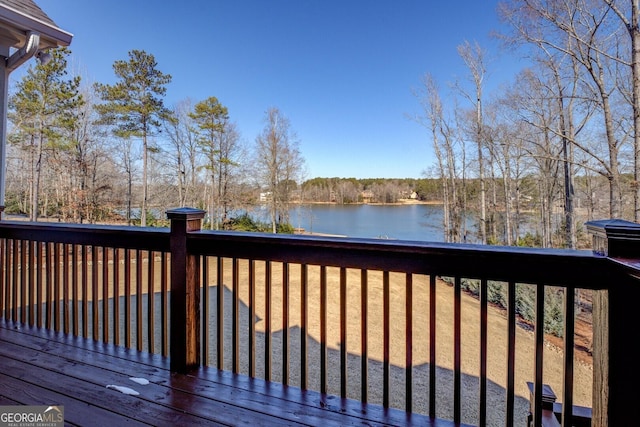 deck featuring a water view