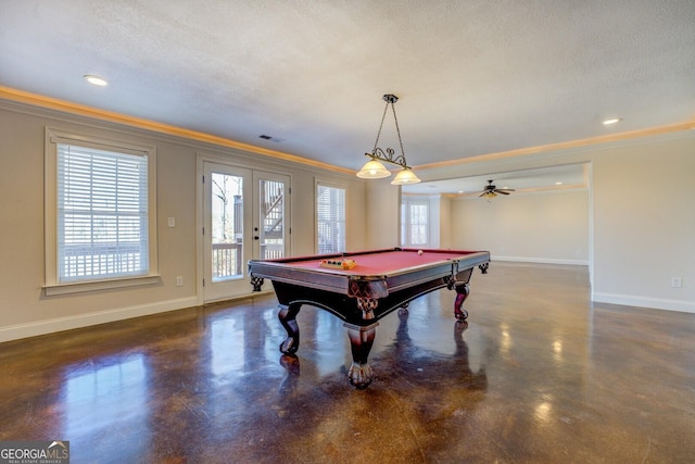 rec room with french doors, crown molding, a textured ceiling, and billiards