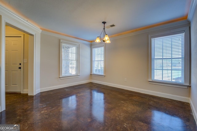 unfurnished room featuring ornamental molding and a notable chandelier