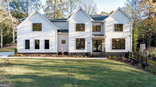 modern farmhouse with a front lawn