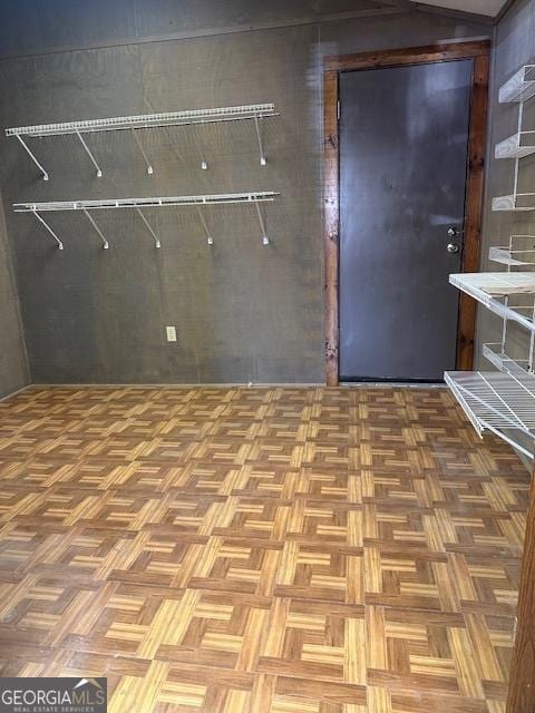 interior space featuring parquet flooring