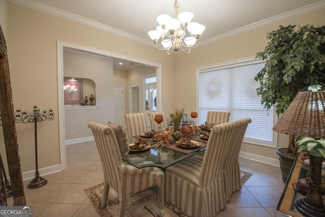 tiled dining area with crown molding and a chandelier