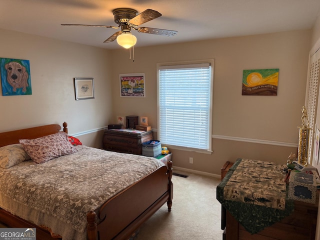 bedroom featuring ceiling fan and carpet flooring