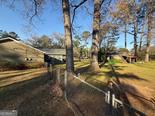 128 Byron Plantation Rd, Albany, GA 31721 - view of yard featuring fence