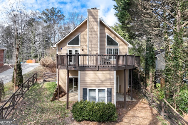 rear view of house with a deck