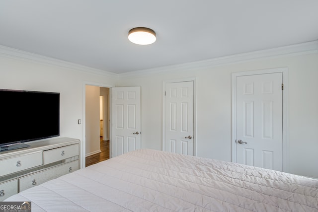 bedroom featuring ornamental molding