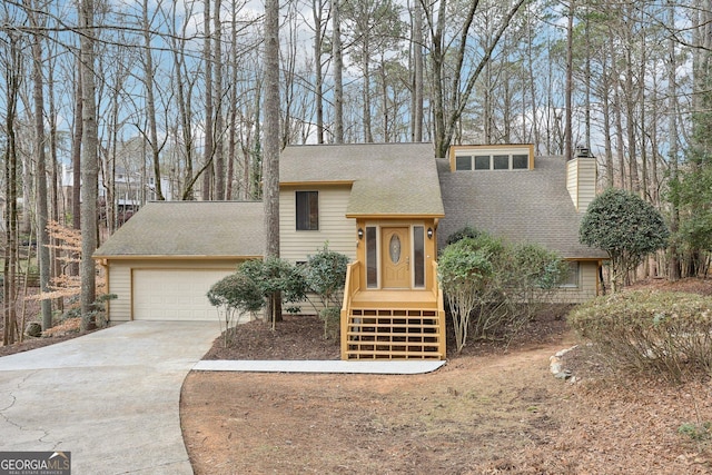 view of front of property with a garage