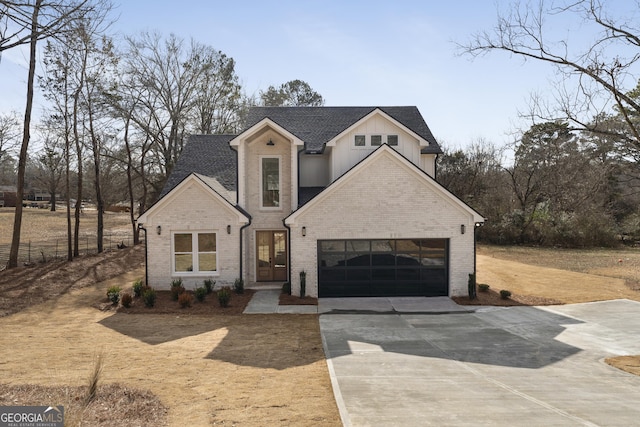 view of front of property with a garage