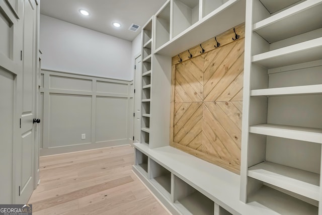 mudroom with light wood-type flooring