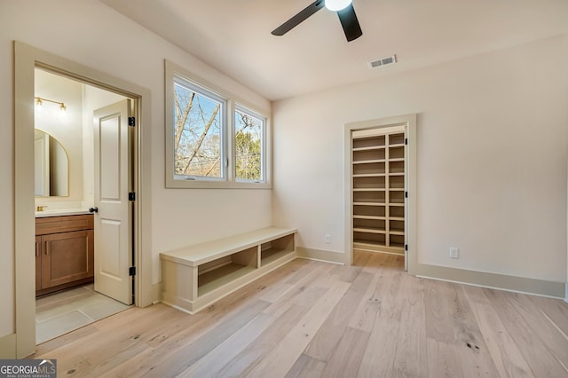 mudroom featuring light hardwood / wood-style flooring and ceiling fan