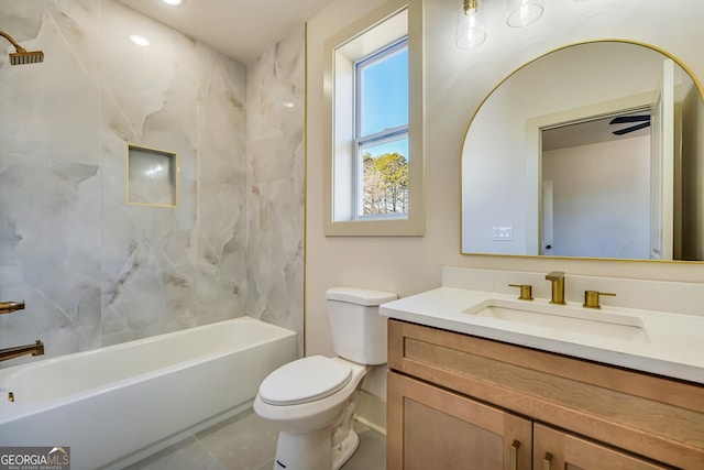 full bathroom with vanity, toilet, tiled shower / bath combo, and tile patterned flooring