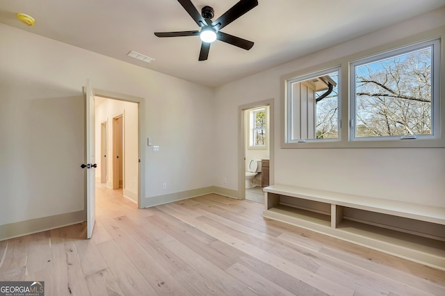 interior space with ceiling fan and light hardwood / wood-style floors