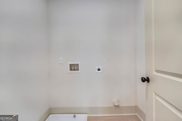 laundry area with washer hookup, hookup for an electric dryer, and hardwood / wood-style floors