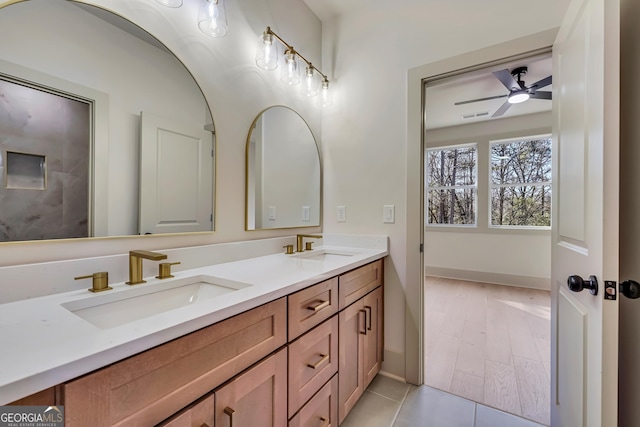 bathroom with vanity, tile patterned flooring, and ceiling fan