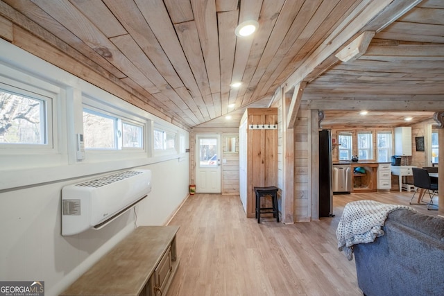 interior space with lofted ceiling, wood walls, wood ceiling, a wall mounted AC, and light hardwood / wood-style floors