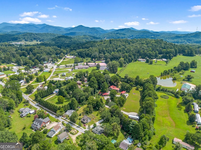 aerial view with a water and mountain view