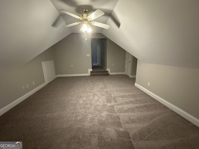 bonus room with ceiling fan, lofted ceiling, and carpet