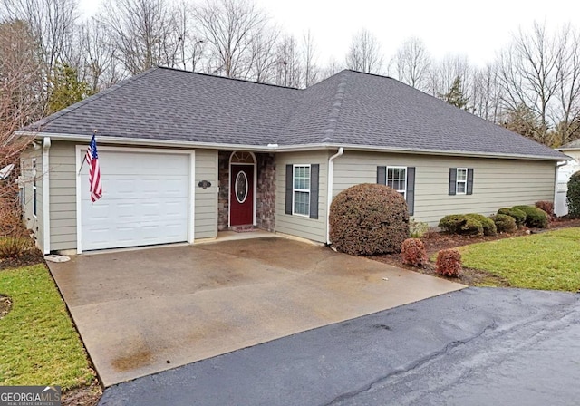 ranch-style home with a garage