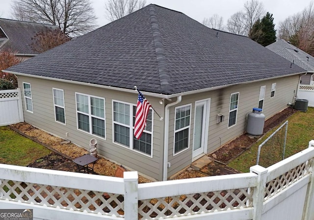 exterior space featuring central AC unit