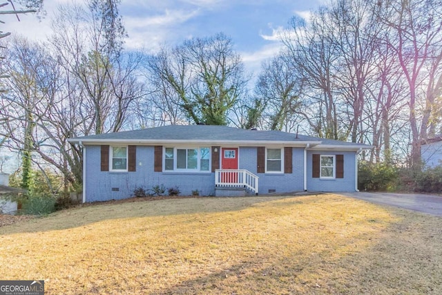 ranch-style house with a front yard