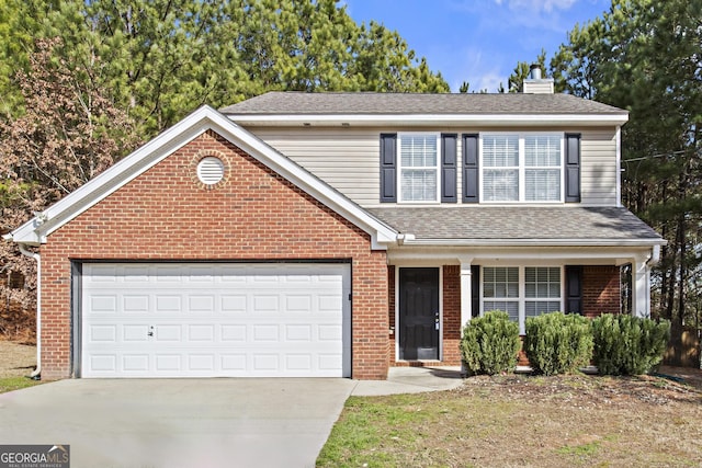 view of front property with a garage