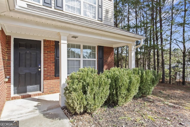 entrance to property with covered porch