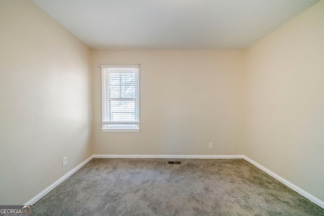 empty room featuring carpet