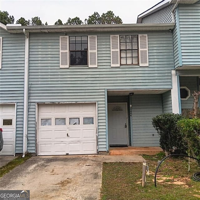 view of property featuring a garage