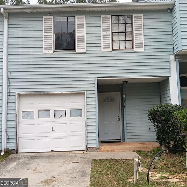 entrance to property featuring a garage