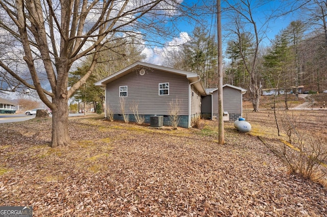 view of home's exterior featuring cooling unit