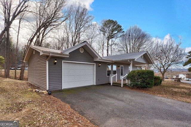 single story home with a garage