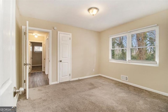 view of carpeted spare room