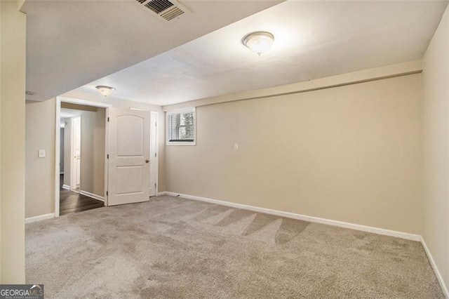 empty room featuring carpet flooring