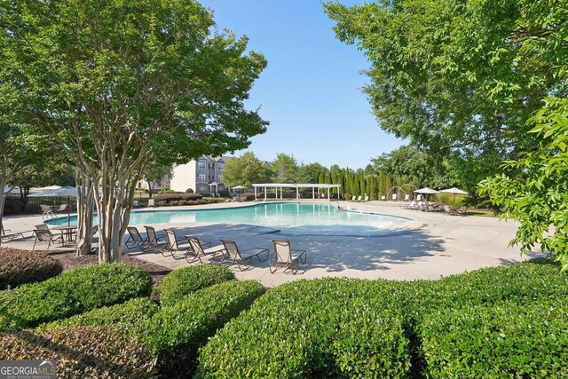 5534 Radford Loop, Fairburn, GA 30213 - community pool with a patio area