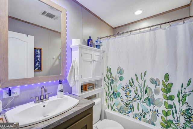 full bathroom featuring tasteful backsplash, vanity, toilet, crown molding, and a textured ceiling