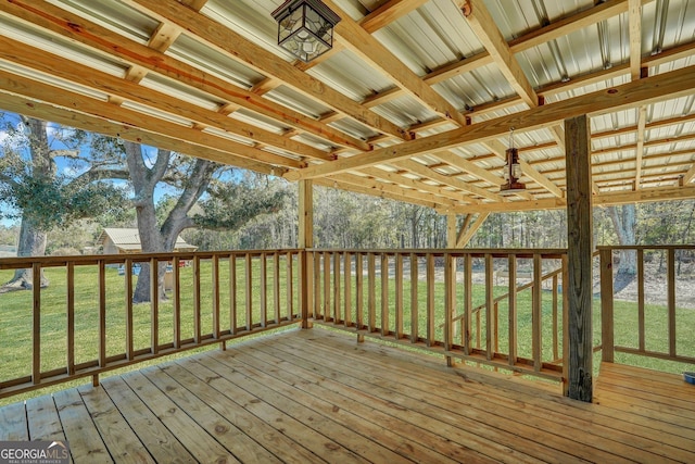 deck featuring a lawn