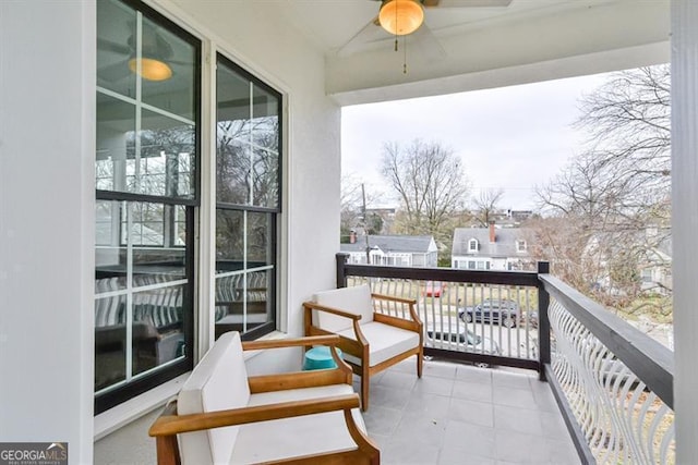 balcony featuring ceiling fan