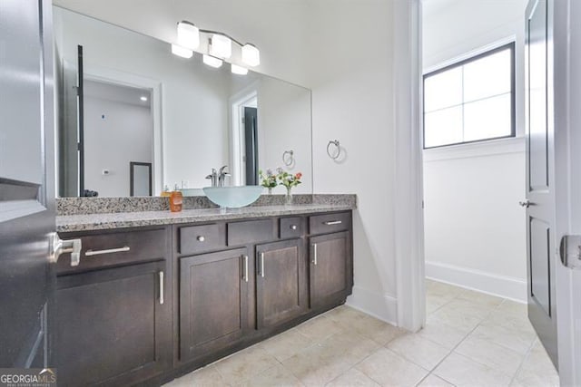 bathroom featuring vanity and tile patterned floors