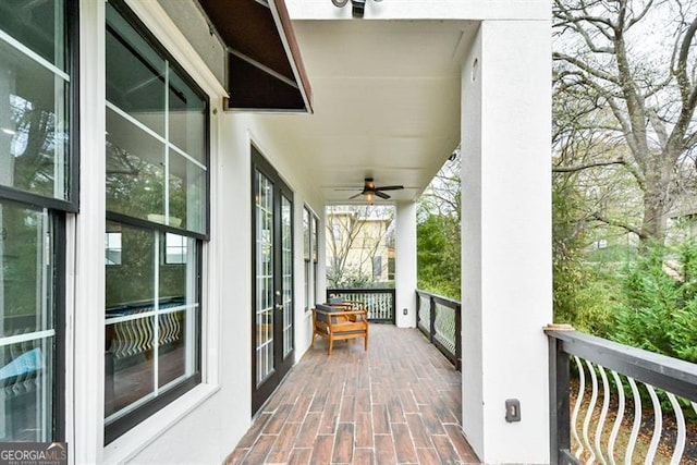 balcony featuring ceiling fan