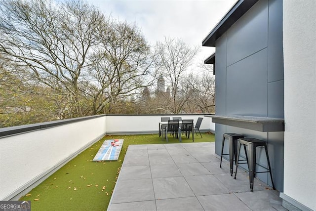 view of patio / terrace with exterior bar