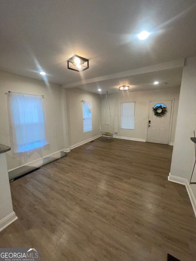 empty room featuring dark hardwood / wood-style floors