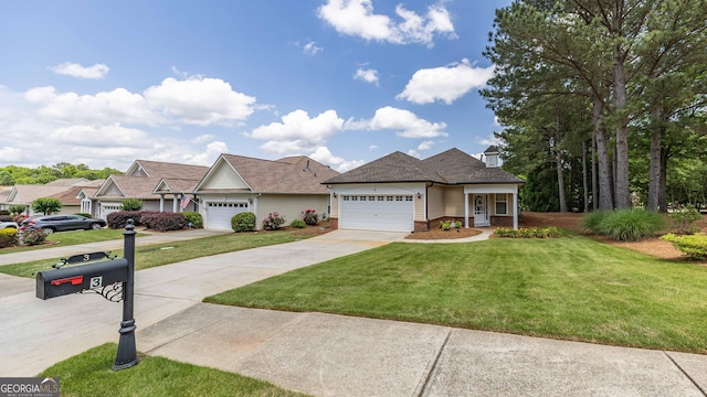 view of front facade featuring a garage and a front yard