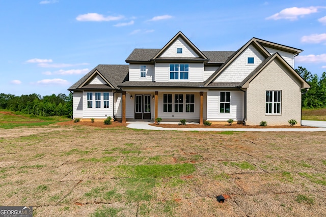 1593 Bethesda Church Rd, Carrollton, GA 30117 - view of front of house with a front yard and roof with shingles